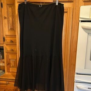 Beautiful and elegant chiffon black skirt with black underlay.